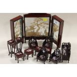 AN ORIENTAL DOLLS HOUSE SET AND SCREEN