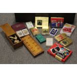 A BOX OF ASSORTED CIGARETTE CARDS IN ALBUMS ETC TOGETHER WITH A BOX OF ASSORTED PLAYING CARDS, GLASS