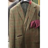 A BROOK TAVERNER TWEED WAISTCOAT AND JACKET SIZE 40R TOGETHER WITH A VINTAGE SKOPES SUIT