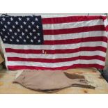 AN AMERICAN FLAG TOGETHER WITH A PAIR OF VINTAGE JODHPURS (2)