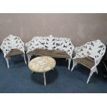 A COALBROOKDALE STYLE 'LILY OF THE VALLEY' GARDEN BENCH AND PAIR OF CHAIRS, and cast aluminium