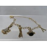 A 9CT GOLD CHARM BRACELET AND CHARMS, some charms unmarked, approximate overall weight 17.8 g
