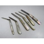 A COLLECTION OF MOTHER OF PEARL HANDLED FRUIT / PENKNIVES, to include four hallmarked silver