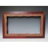A 19TH CENTURY ORIENTAL WOODEN FRAME, with decorative gold inner, frame W 9 cm, rebate 70 x 40 cm