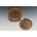 TWO COPPER CIRCULAR HANGING PLAQUES, Dia 18 cm and 16 cm