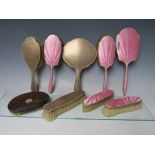 A COLLECTION OF HALLMARKED SILVER DRESSING TABLE ITEMS, comprising a five piece set with pink