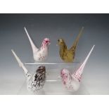 A COLLECTION OF FOUR WEDGWOOD LONG TAIL GLASS BIRDS, varying colourways, two being signed to base,