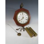 A 19TH CENTURY 8 DAY CUCKOO CLOCK, with brass weights and pendulum, the mahogany octagonal case with