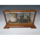 AN EARLY 20TH CENTURY OAK CASED BAROGRAPH BY ESHELBY - 5 EDEN QUAY - DUBLIN, having five bevelled