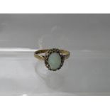 A HALLMARKED 9CT GOLD OPAL AND DIAMOND DRESS RING, hallmarks indistinct, ring size Q ½,