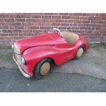 AN ORIGINAL AUSTIN J40 PEDAL CAR, finished in red with chrome fixtures and fittings, complete with