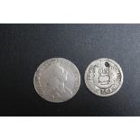 A WILLIAM III SHILLING TOGETHER WITH A SPANISH REAL? TYPE COIN (2)