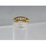 AN 18CT GOLD AND DIAMOND RING, set with four old Dutch cut diamonds, ring size N ½, approximately