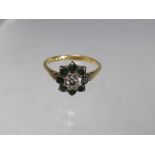 AN 18CT GOLD EMERALD AND DIAMOND CLUSTER DRESS RING, ring size Q, approximately 3.85 g