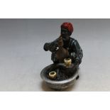 A COLD PAINTED BRONZE STUDY OF AN ARAB MAKING COFFEE, H 9.5 cm
