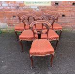 A SET OF SIX MID VICTORIAN MAHOGANY DINING CHAIRS, each with carved detail to the mid-rail, raised