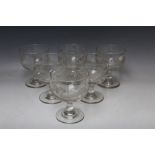 A SET OF SIX EARLY 20TH CENTURY ETCHED GLASS GOBLETS, the over-sized bowls decorated with etched