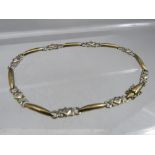 A 9CT WHITE AND YELLOW GOLD GEMSET BRACELET, approximately 6.8 g