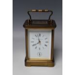 A MATTHEW NORMAN BRASS CARRIAGE CLOCK, the movement numbered '1750', H 14 cm