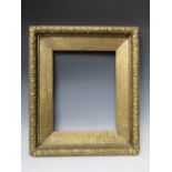 A 19TH CENTURY GOLD FRAME, with design to outer edge and gold slip, frame W 4 cm, slip rebate 38.5 x