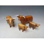 A BESWICK HIGHLAND BULL, COW AND TWO CALVES (4)
