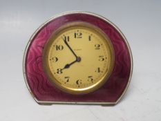 A GUILLOCHE ENAMELLED 8 DAY DESK TIMEPIECE, on easel support