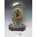 A GOOD QUALITY BELL STRIKE SKELETON CLOCK WITH GLASS DOME, the hand cut brass frame having a