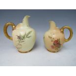 TWO VINTAGE ROYAL WORCESTER CREAM / MILK JUGS, with flower decoration and gilt handles, Reg No.