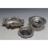 A SMALL HALLMARKED SILVER PIERCED NUT DISH, together with two small 925 silver dishes, approx