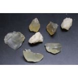 A COLLECTION OF ASSORTED LIBYAN DESERT GLASS STYLE FRAGMENTS, over 50 pieces, untested, approx