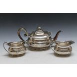 A HALLMARKED SILVER THREE PIECE TEA SERVICE BY HARRISON BROTHERS AN HOWSON - SHEFFIELD 1946, with