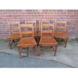 A SET OF SIX 19TH CENTURY OAK PLANK SEAT DINING CHAIRS