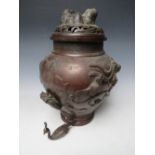 A LARGE LATE 19TH / EARLY 20TH CENTURY BRONZE BALUSTER TEMPLE JAR AND COVER, the body decorated with