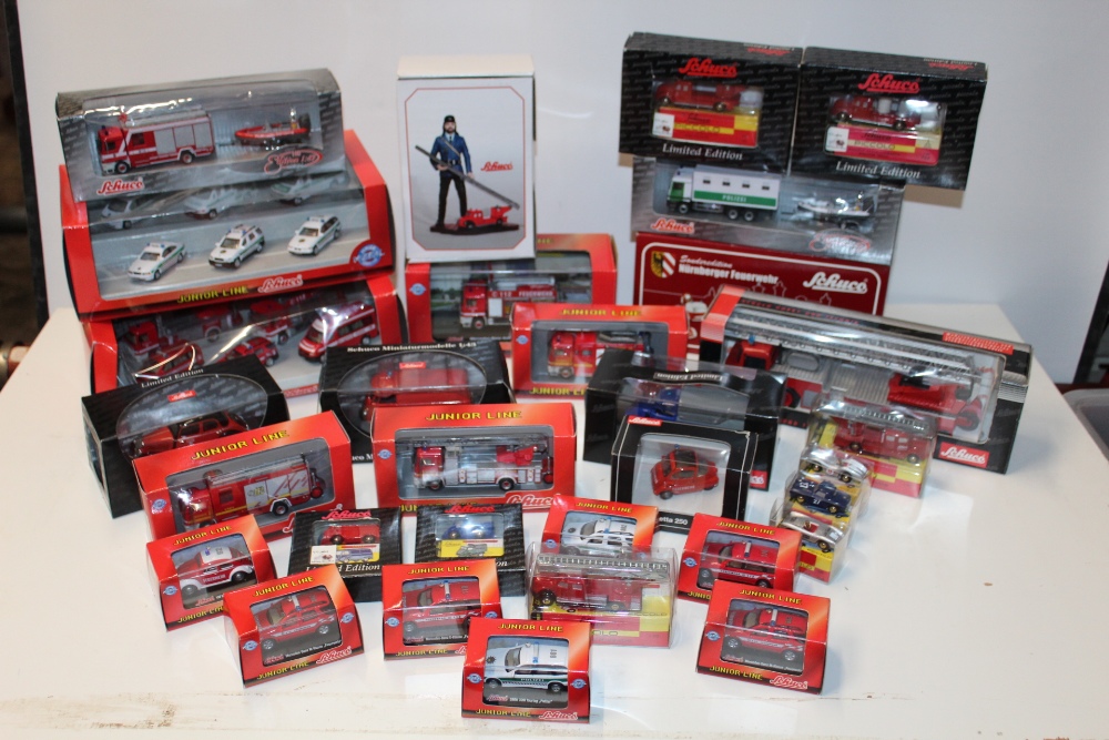 TWENTY EIGHT BOXED SCHUCO EMERGENCY SERVICES VEHICLES,mixed scales, some limited edition