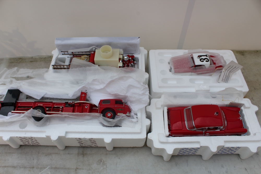 THE FRANKLIN MINT PRECISION MODELS - FOUR BOXED DIE CAST MODELS, comprising the American LaFrance