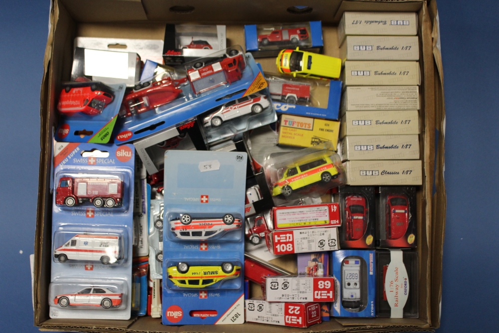 A TRAY OF CARDED VEHICLES BY SIKU, Matchbox, Matel etc., together with a collection of boxed 1:87