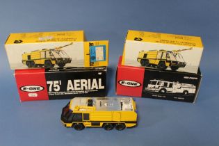 FOUR BOXED VEHICLES, to include E-One Hush Pumper 800106, E-One 75 Aerial 800107, Rosenbauer Simba x