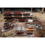 TWELVE CASED CODE 3 COLLECTIBLES FIRE ENGINES, to include FDNY Super Pumper, FDNY Heavy Rescue