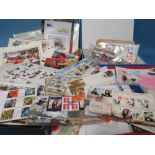 FOUR FOLDERS CONTAINING FIRST DAY COVERS / LOOSE STAMPS, plus Collectors Vehicles catalogues