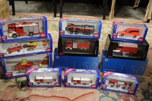 TWELVE BOXED EMERGENCY SERVICES VEHICLES, to include eight by Siku, two Schuco 1:43 scale and two