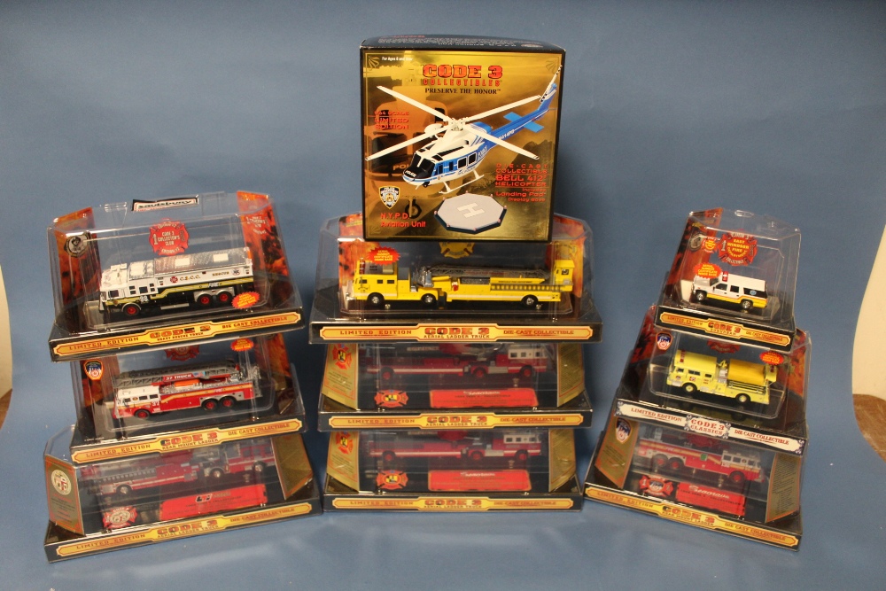 TEN BOXED CODE 3 EMERGENCY SERVICE VEHICLES, to include four aerial ladder fire engines, rear