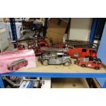 TWO TIN PLATE FIRE ENGINES, a metal fire engine and two fire engine money boxes