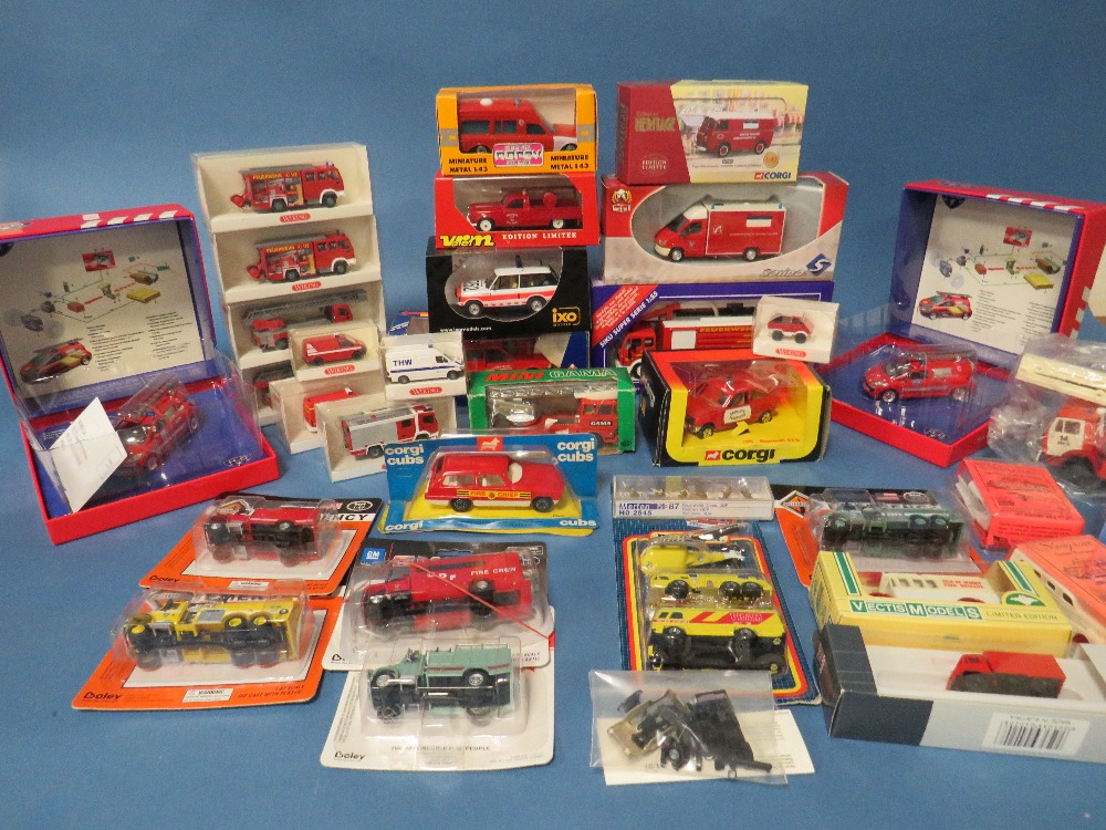 THIRTY FIVE BOXED AND CARDED EMERGENCY SERVICES VEHICLES, by Corgi, Norev, Siku, Gama, matchbox,
