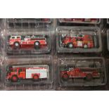 FIFTY FIRE ENGINES IN CLEAR PLASTIC SEALED BOXES