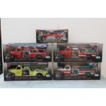 HIGHWAY 61 COLLECTIBLES - FOUR BOXED HEAVY DUTY FIRE TRUCKS, 1:16 die cast models, together with a