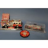 A BOXED CODE 3 COLLECTABLES 1:64 SCALE LIMITED EDITION SEAGRAVE REAR MOUNT LADDER, together with a