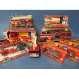 A BOX OF TEN PLASTIC FIRE RELATED VEHICLES, nine boxed / one loose, makes include Dickie, Funrise,