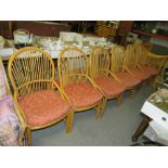 A SET OF SIX WICKER CHAIRS