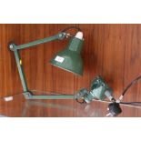 A VINTAGE GREEN ENAMEL WALL MOUNTING ANGLE POISE LAMP