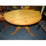 A HONEY PINE PEDESTAL TABLE